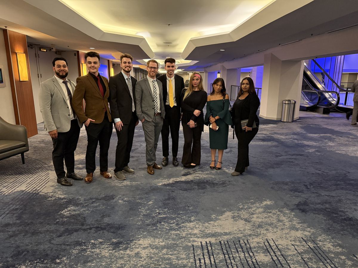 The Clarity Acquisitions team at a professional event
