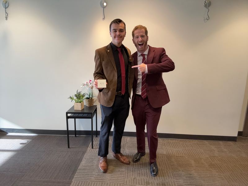 Brysaac celebrating a milestone with Dustin Harward