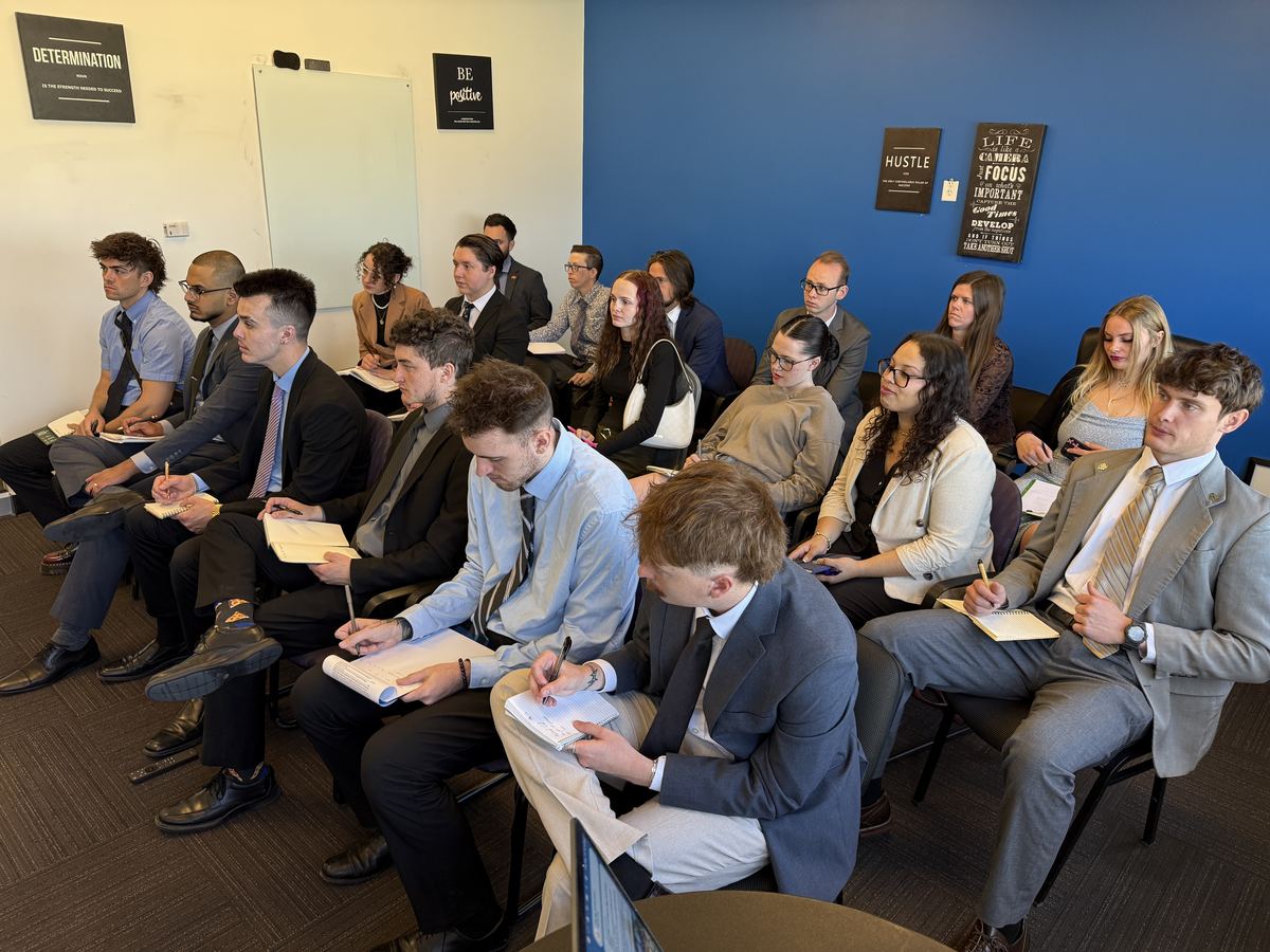 Clarity representatives in a training session before a client campaign